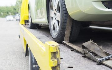 car transporter breakdown lorry working using locked belt transport other green car